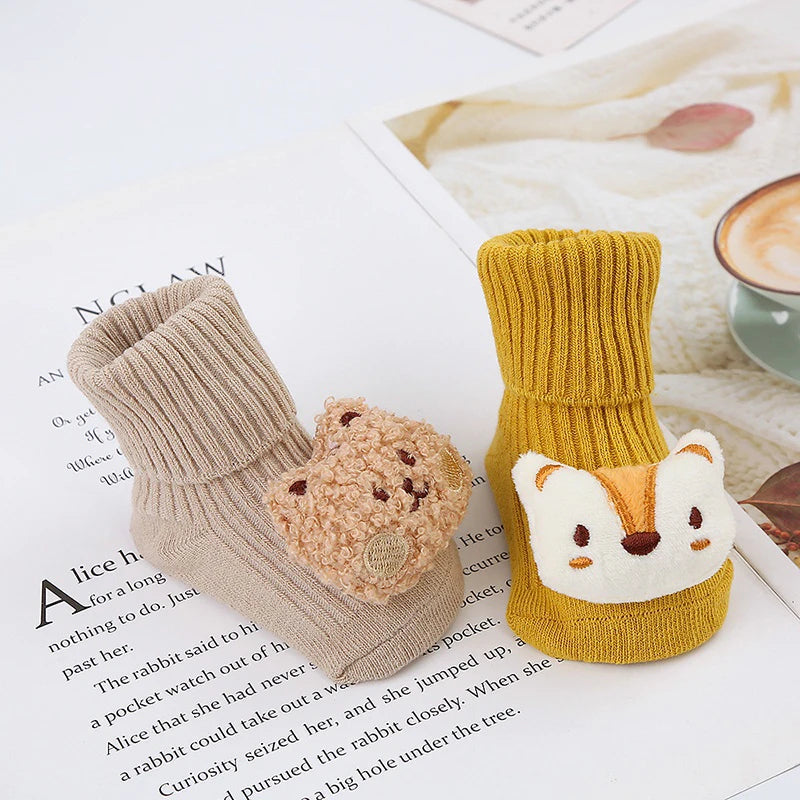 Baby-Plüschsocken mit Spielzeugmotiv