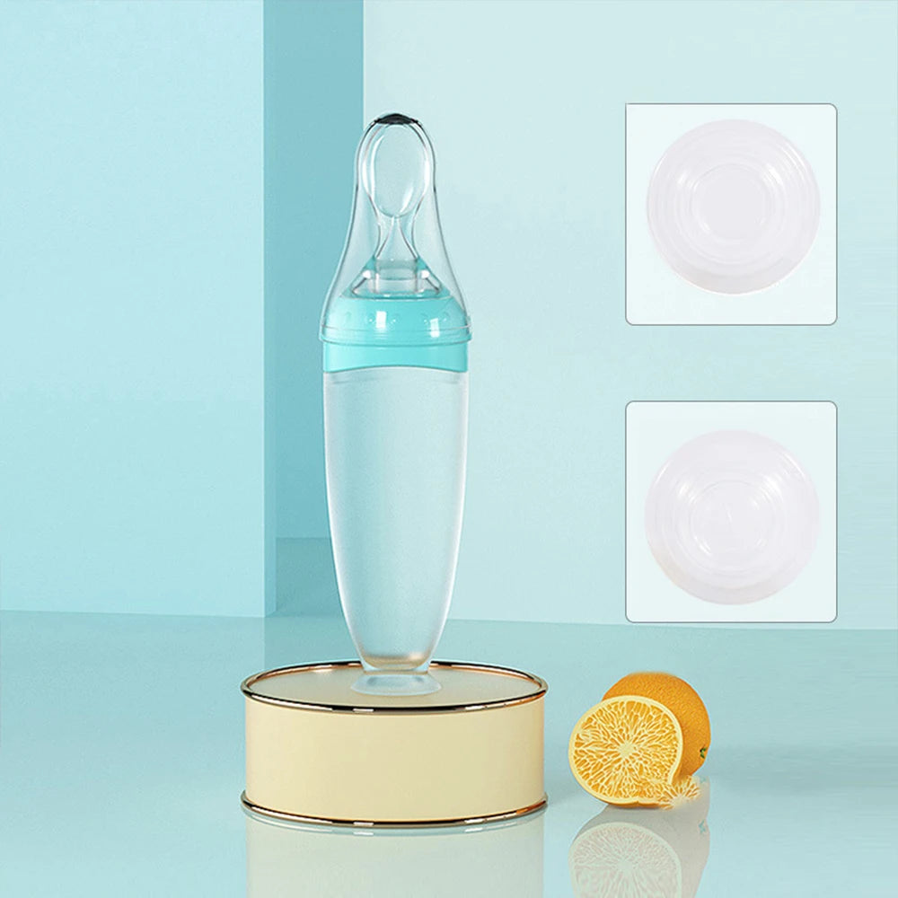Baby-Trinkflasche mit Löffel
