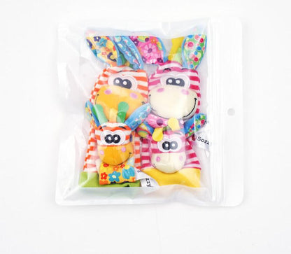 Sensorische Kuschelsocken und Greifband für Babys