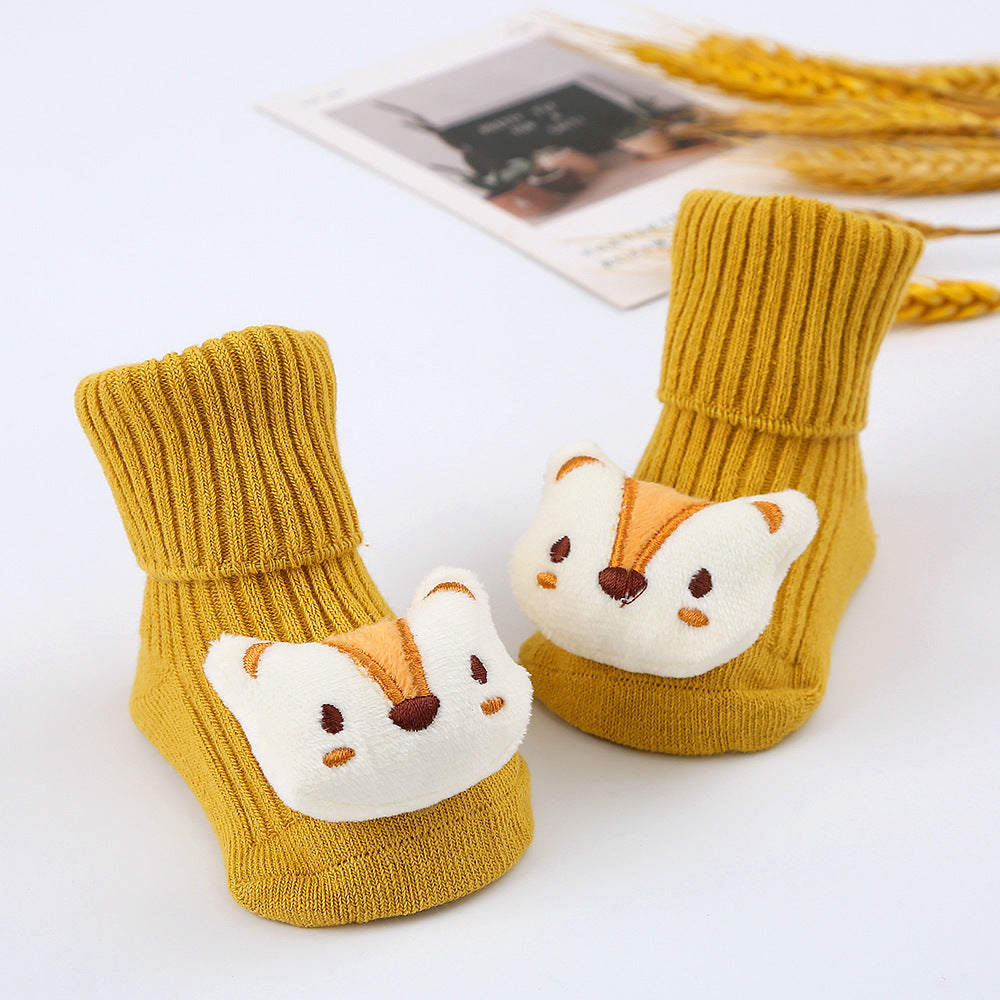 Baby-Plüschsocken mit Spielzeugmotiv