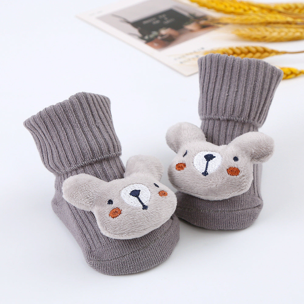 Baby-Plüschsocken mit Spielzeugmotiv