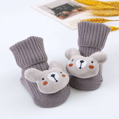 Baby-Plüschsocken mit Spielzeugmotiv