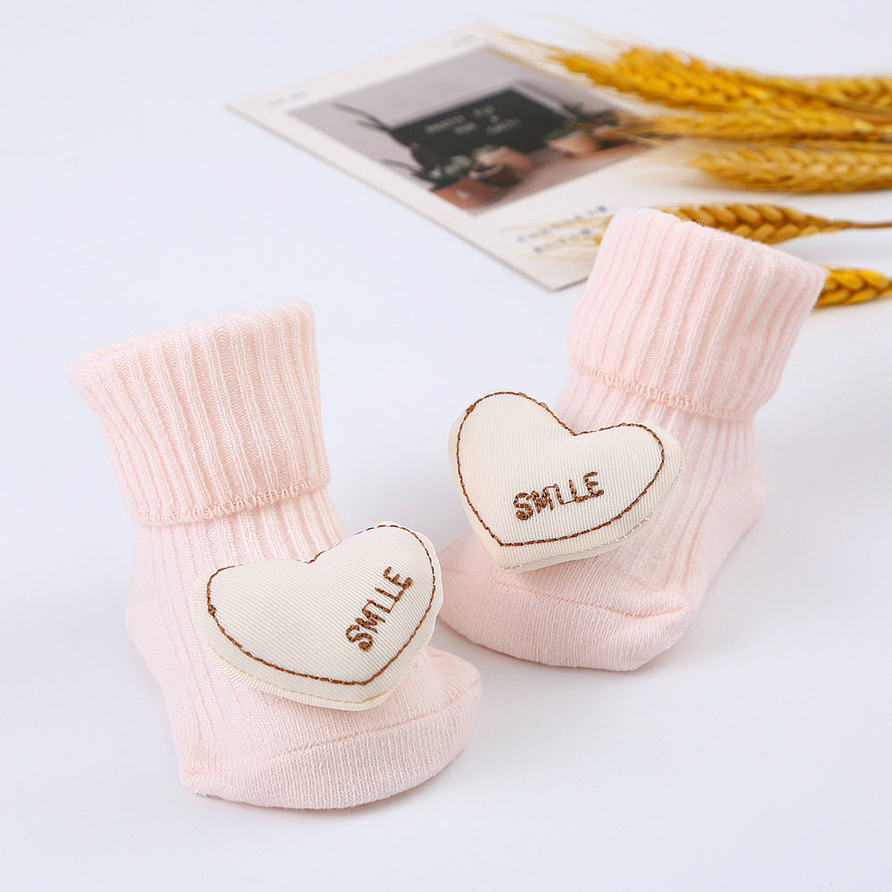 Baby-Plüschsocken mit Spielzeugmotiv