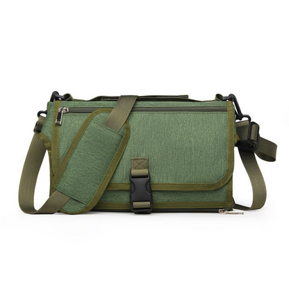 Kompakte Wickelunterlage mit Taschen für unterwegs