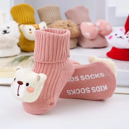 Baby-Plüschsocken mit Spielzeugmotiv