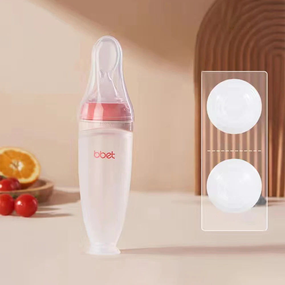 Baby-Trinkflasche mit Löffel