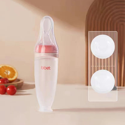 Baby-Trinkflasche mit Löffel